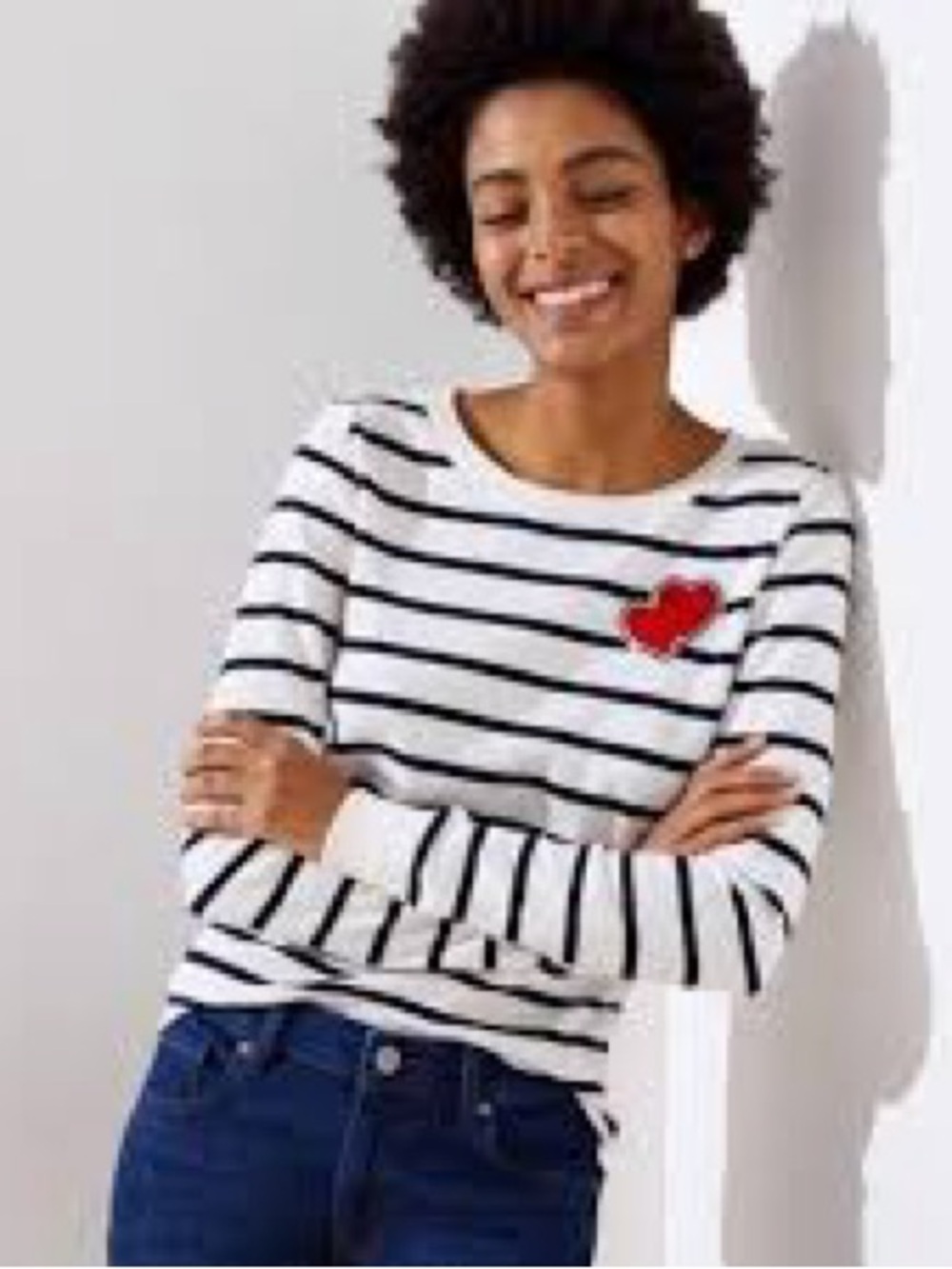 LOFT striped long-sleeve sweater featuring a heart patch appliqué on the chest.